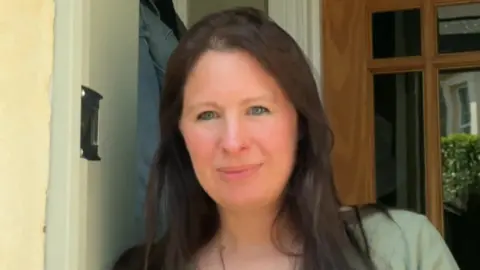 BBC Gayle McGregor standing in her doorway