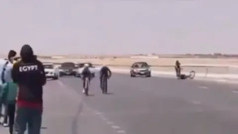 Almadinanews Video posted online showed Ganna Eliwa crashing to the ground after being hit by Shahd Saeed during a road race in Egypt