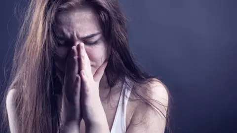 Getty Images Woman crying