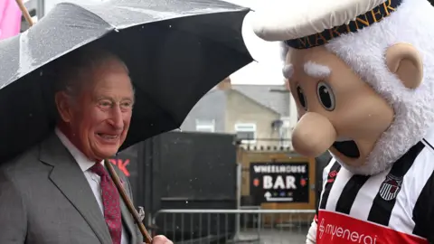 King Charles and the Grimsby Town club mascot The Mighty Mariner