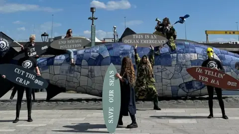 Surfers Against Sewage Belfast protest against Northern Ireland Water