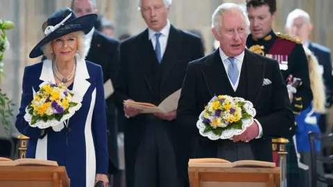 PA Media Prince Charles and Camilla, Duchess of Cornwall arrive for Royal Maundy Service at St George's Chapel