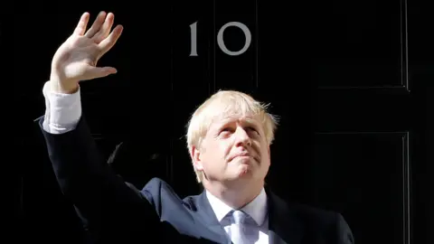 AFP Boris Johnson at door of 10 Downing Street
