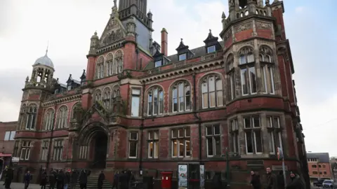 The exterior of York Magistrates Court - an imposing redbrick Victorian building.