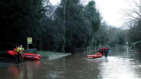 Greg Mape Boats used in rescuing people from flooded Didsbury