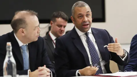 PA Media James Cleverly and Chris Heaton-Harris at Wednesday's meeting