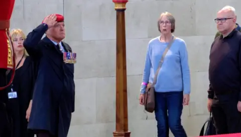 A mourner at Westminster Hall