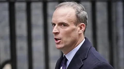 PA Media Dominic Raab