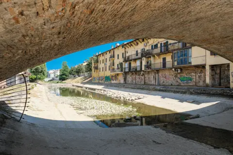 NurPhoto/Getty Images The river under the Ponte di Sant'Agostino di Padova, Padua