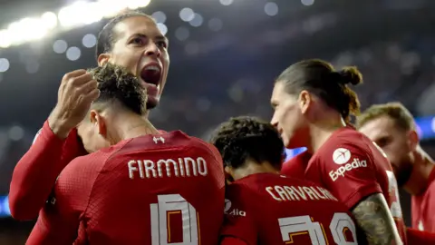 Liverpool and Virgil van Dijk celebrate a goal against Rangers in the Champions League