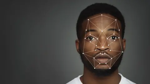 Getty Images Black man with facial recognition algorithms