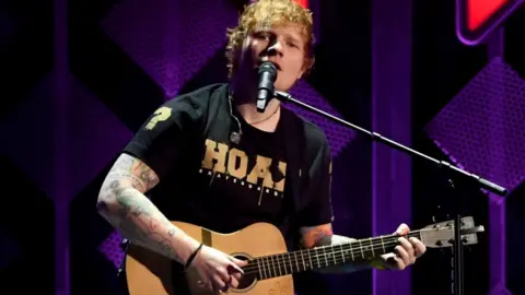 Getty Images Ed Sheeran on stage