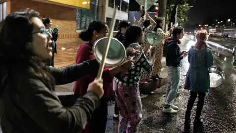 EPA People take part in a protest with pans in Bogota