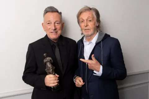 Dave Hogan / Hogan Media / Shutterstock Sir Paul McCartney and Bruce Springsteen at the Ivor Novello Awards