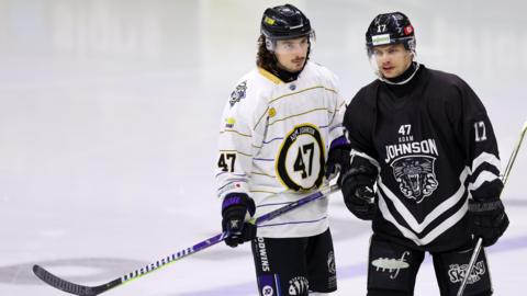 Samuel Tremblay of Manchester Storm (L) and Mathieu Lemay of Nottingham Panthers look on during the Adam Johnson Memorial Game 