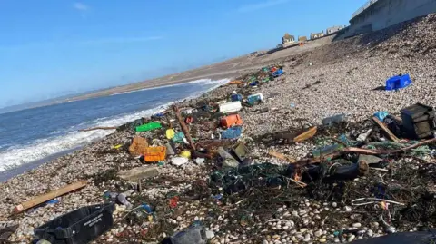 Weymouth and Portland Marine Litter Project A beach covered in fishing rope and other litter