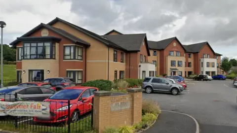 Google The picture if of the care home. It is a stone building with a car park in front.
