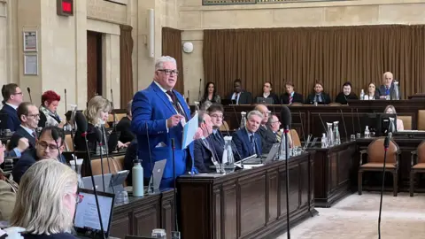 Essex County Council leader Kevin Bentley speaking in the county hall chamber.