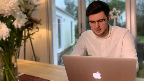 BBC Jack Davies working at home