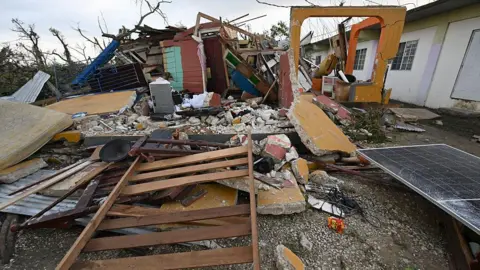 Getty Images Damaged property is seen in the aftermath of Hurricane Melissa in Savanna-la-Mar, Westmoreland, Jamaica, on October 31, 2025. 