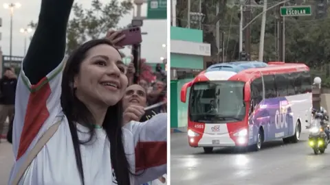Players cheer as a bus carrying the Iranian football team arrives