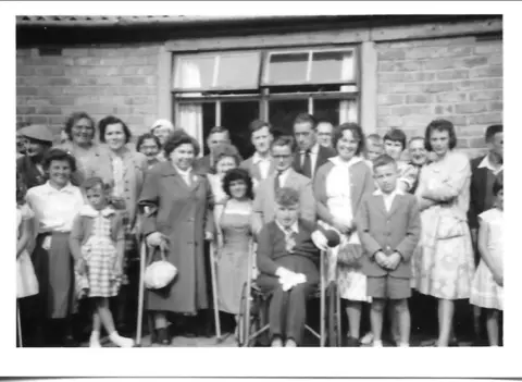 Pauline Tasker A black and white image of members of the Enterprise Club for disabled people in Coventry