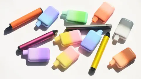 Getty A collection of different coloured vapes