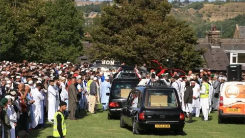 PA Mourners gather in Bradford for the funerals of Murtza Chaudhry, Arbaaz Hussain, Zeeshan Khalid and Tayyab Siddique
