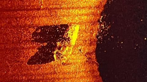 Sidescan sonar image of Quest on seafloor