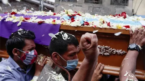 Reuters Friends and family members carry the coffin holding the body of Inti Sotelo, who died in clashes following the ouster of Peru"s President Martin Vizcarra, in Lima, November 16, 2020.