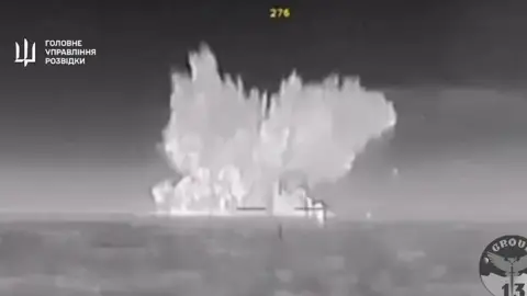 Video appears to show Ukrainian drones sink Russian warship