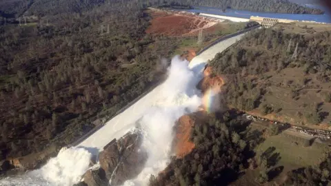 Reuters The damaged spillway and the eroded hillside at the Oroville Dam