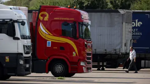 Getty Images hgv driver and lorry