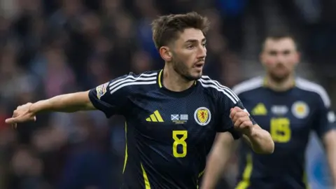SNS Scotland's Billy Gilmour with the ball at his feet during a UEFA Nations League 2024/25 League Play-Off Second Leg match between Scotland and Greece at Hampden Park, on March 23, 2025, in Glasgow, Scotland