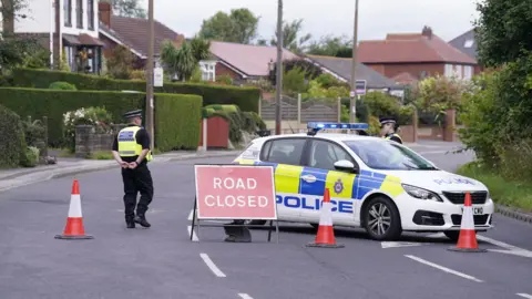 PA Police vehicle at crash scene on A61