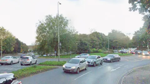 A Google Maps image shows heavy traffic at the roundabout outside Norfolk County Hall, from Bracondale looking towards Martneau Lane