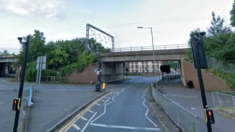 Google The photo shows the road running under the bridge at New Bedford Road