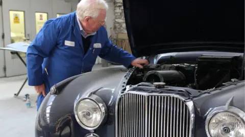 Charles Palmer at his garage