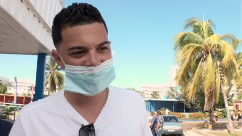 Leno Fernández outside a dollar store in Havana