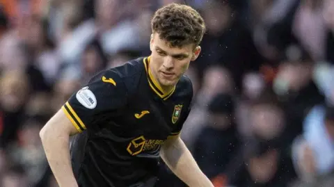 Lewis Smith in action for Livingston