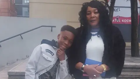 Family Dea-John and his mother Joan