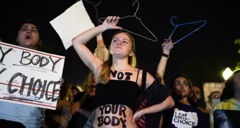 Kent Nishimura Young women protest outside