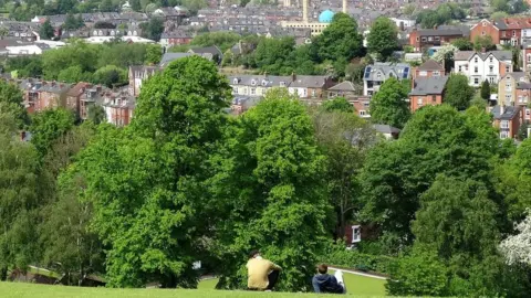 Geograph/Neil Theasby People relaxing in Meersbrook Park
