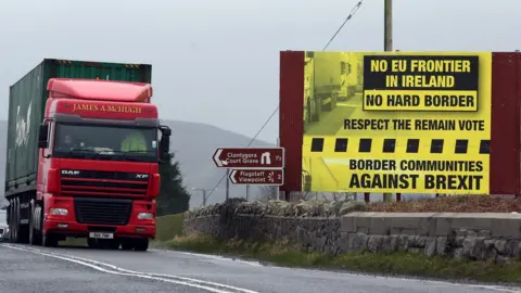 AFP A lorry crosses the Irish border