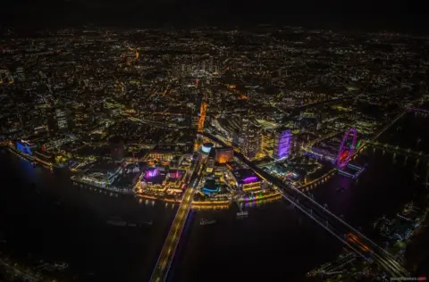 Jason Hawkes Night aerial view of Southbank