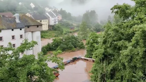 Twitter @ReneNijholt via Reuters A view of a flooded area in Kyllburg, Germany