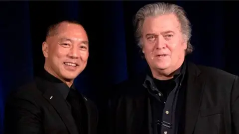 Mr Guo and Mr Bannon pictured together in 2018