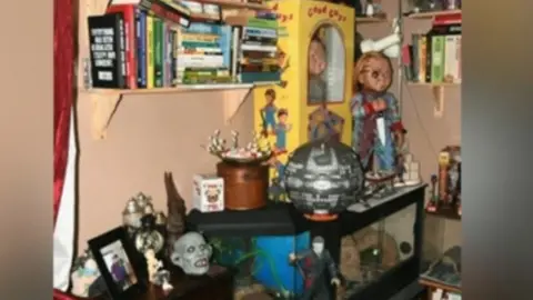 West Midlands Police The inside of the killers' home featuring Chucky dolls