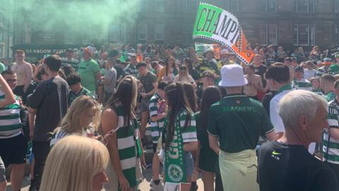Celtic fans celebrating in Glasgow