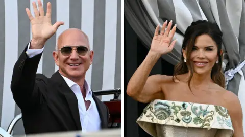 A composite image of Jeff Bezos and Lauren Sanchez waving. Jeff is wearing a black suit and a white shirt. Lauren is wearing a dress with silver and floral details. 